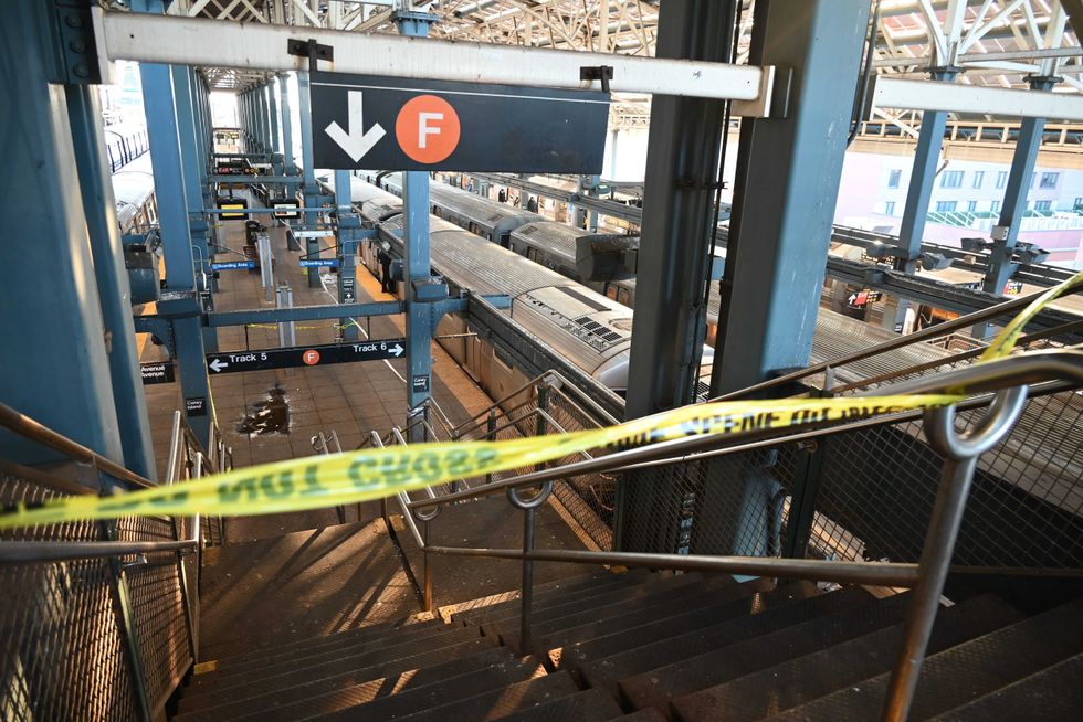 Police investigate at the Coney Island-Stillwell Avenue station in Brooklyn on Dec. 22, 2024, after a woman was set on fire aboard a train.
