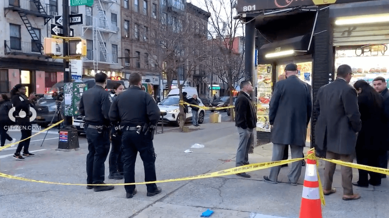 Police investigate at the deli on Feb. 26, 2024