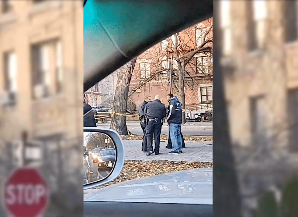 Police investigate at the scene after the shooting at Rochester Avenue and Eastern Parkway on Dec. 14, 2022