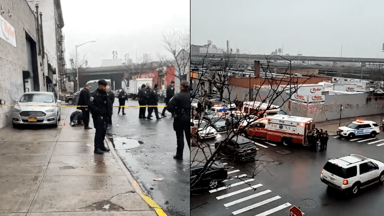 Police investigate at the scene of a drive-by shooting in Mott Haven on Monday afternoon