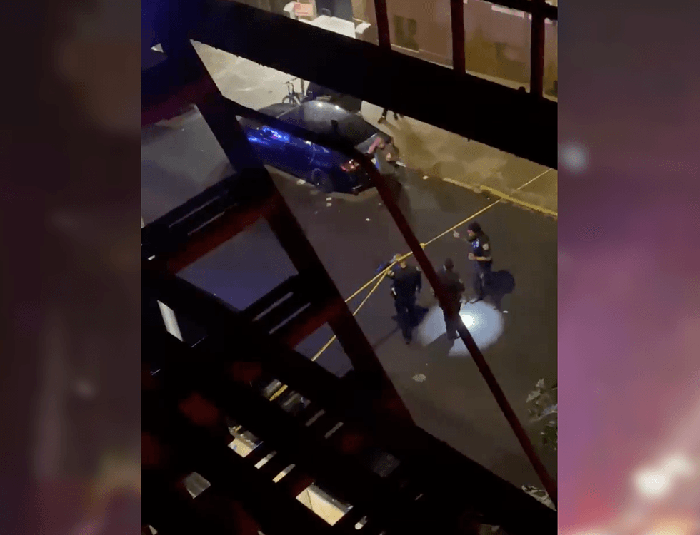 Police investigate at the scene of Sunday night