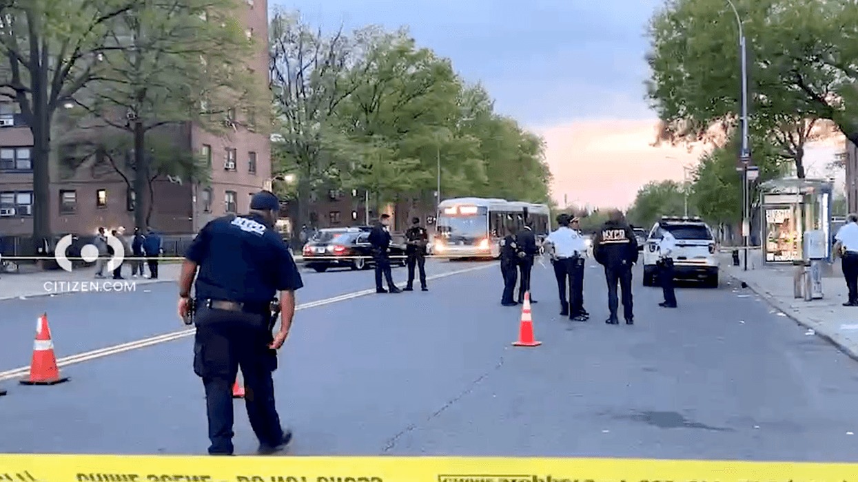 Police investigate at the scene of the fatal shooting at the NYCHA Throggs Neck Houses on Monday evening