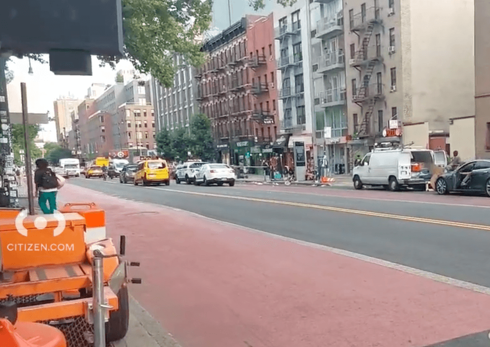 Police investigate at the scene on Sunday evening