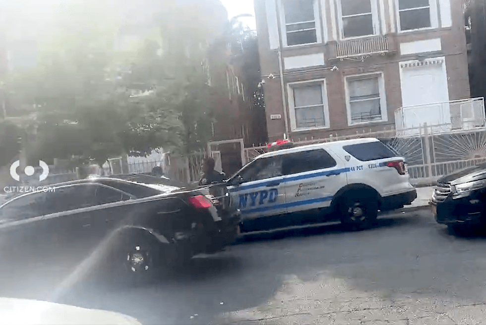Police investigate at the scene on Tuesday evening