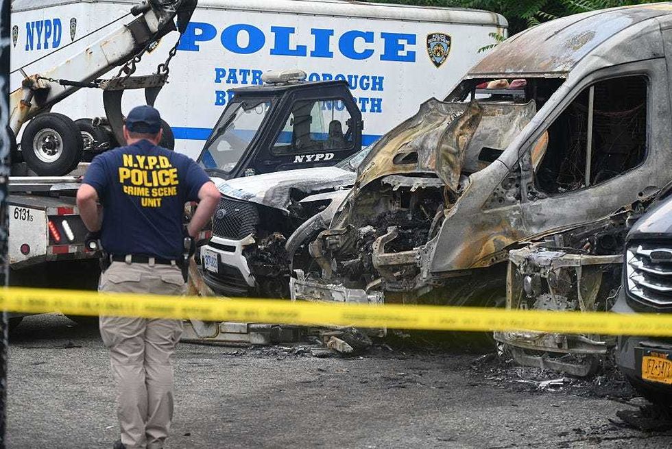 Police investigate following the arson of nearly a dozen NYPD vehicles in Bushwick, Brooklyn.