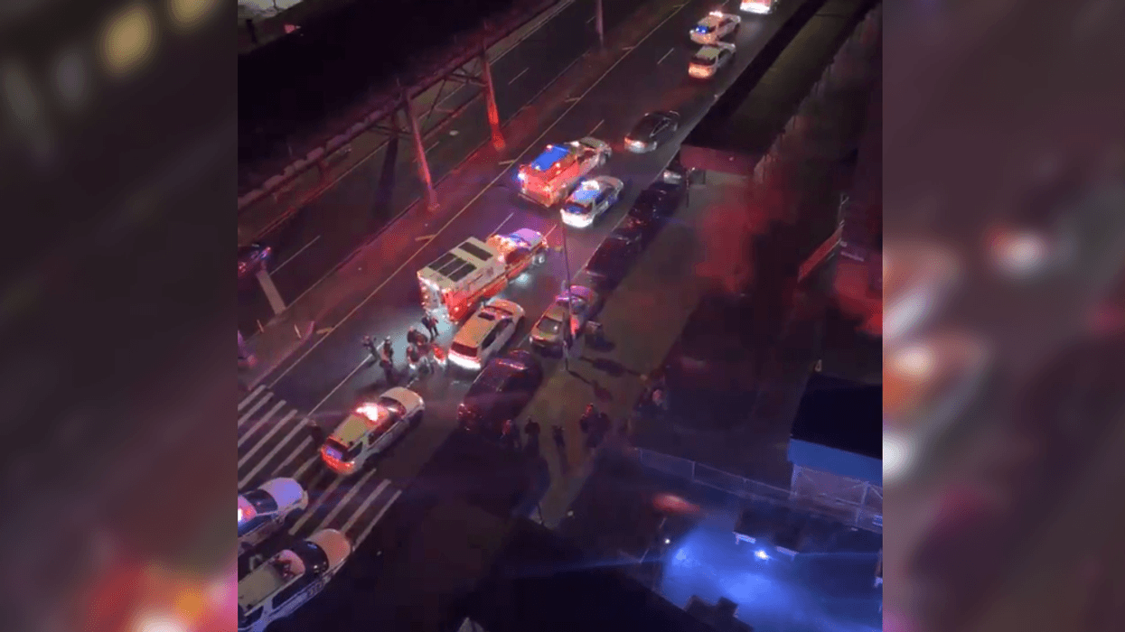 Police investigate in the area of W. 225th Street and Broadway following a police-involved shooting on Wednesday night