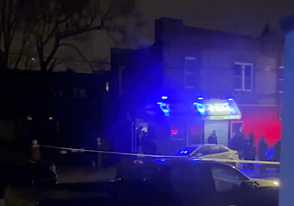 Police investigate outside a bar where a man was shot and killed in St. Albans on Monday night