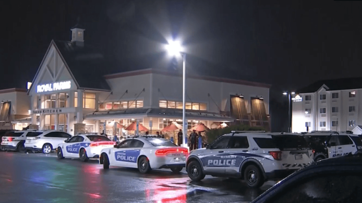 Police investigate outside a Royal Farms in Ridley Park