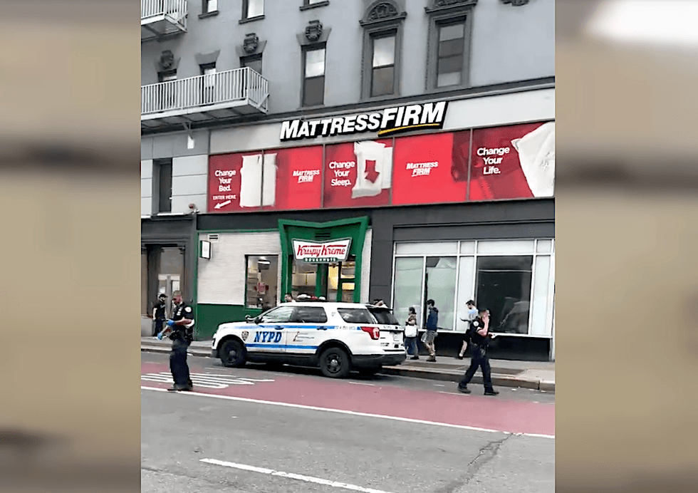 Police investigate outside the 86th Street station on the Upper East Side on Sunday afternoon
