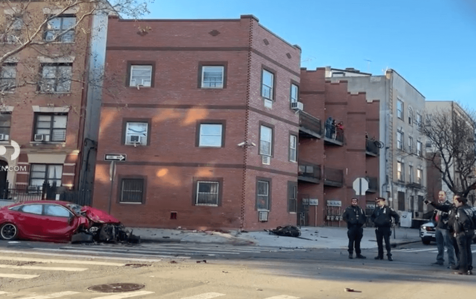 Police investigate the crash at Fox Street and Intervale Avenue.
