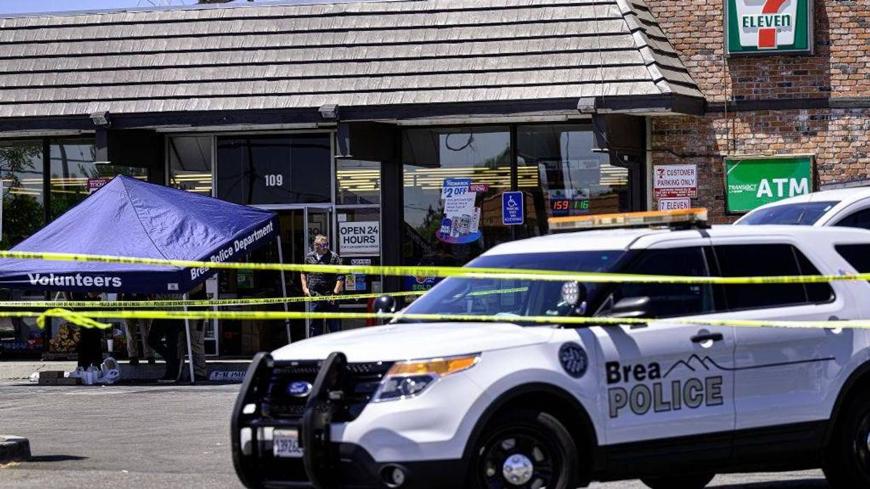 Police investigate the fatal shooting of a clerk at a Brea 7-Eleven on Monday, July 11, 2022, during a robbery. Police believe the crime is tied to a shooting and robbery at a 7-Eleven in La Habra.