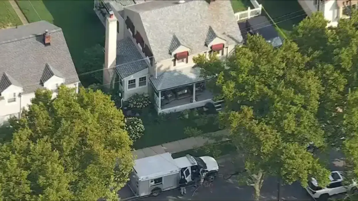 Police investigate the scene at a house in Bristol Borough on Thursday, Aug. 13, 2026.