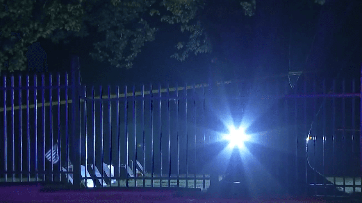 Police investigate the scene of a shooting overnight at Holy Sepulchre Cemetery in Glenside.