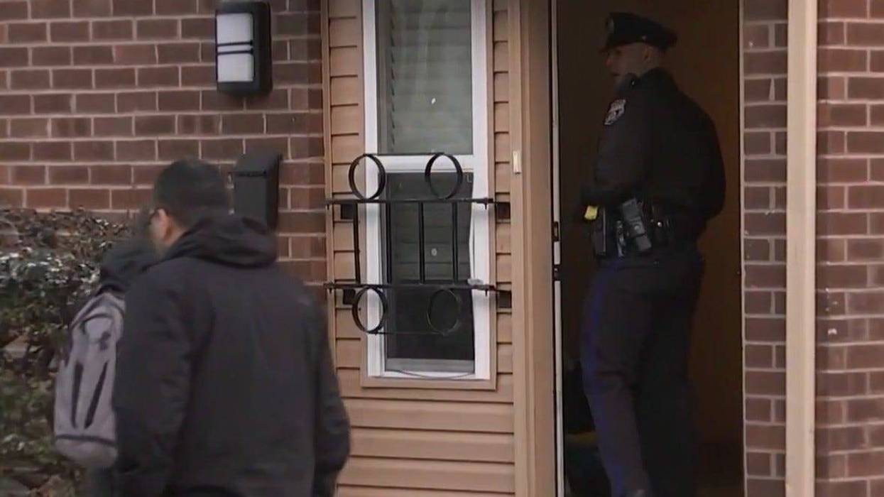 Police investigate the scene of a shooting they say left a 17-year-old dead Saturday in East Germantown.
