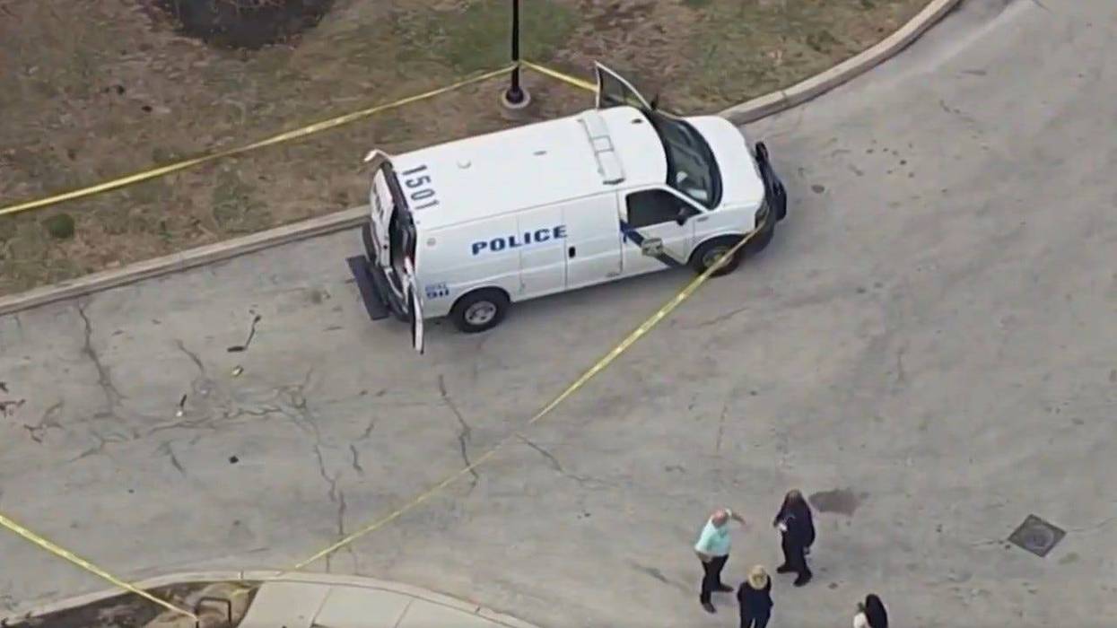 Police investigate the scene of an officer-involved shooting near Friends Hospital in Northeast Philadelphia on March 20.