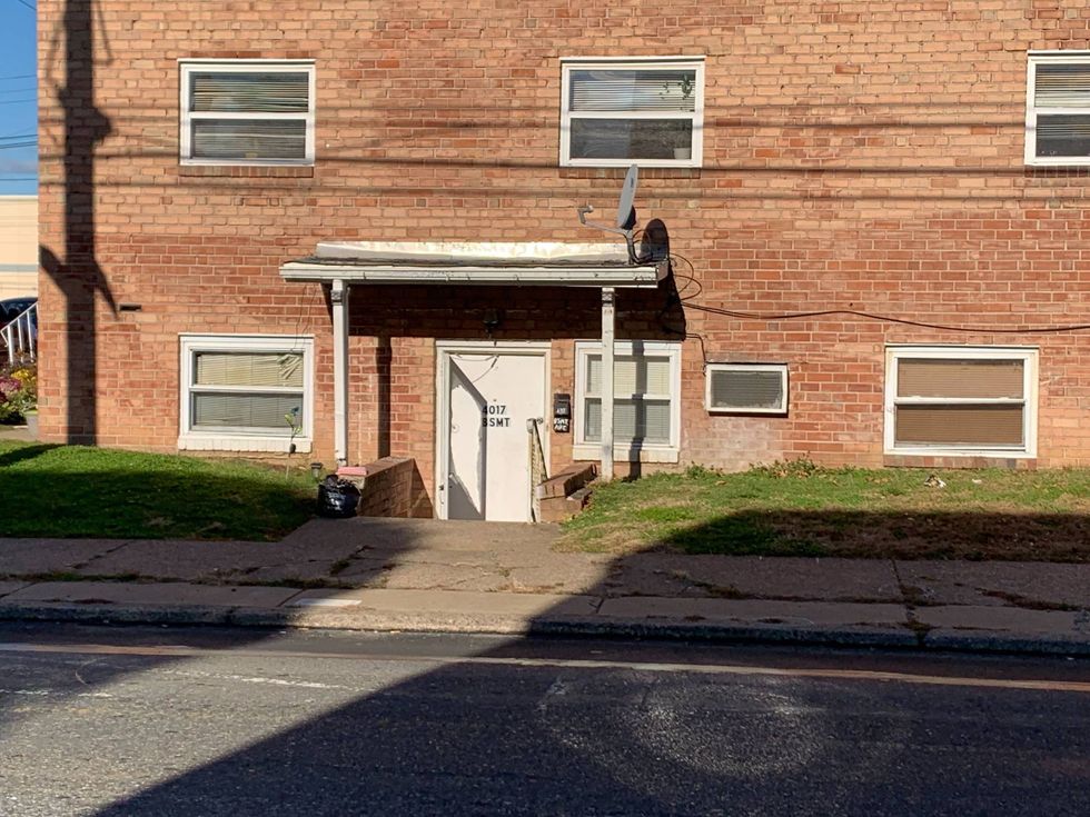Police investigating after 2 men shot in stairwell of Mayfair apartment building