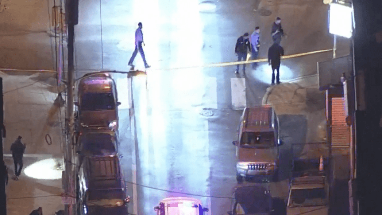 Police investigating the scene after cops in unmarked car were shot at, 1 injured by shattered glass during the incident in November.