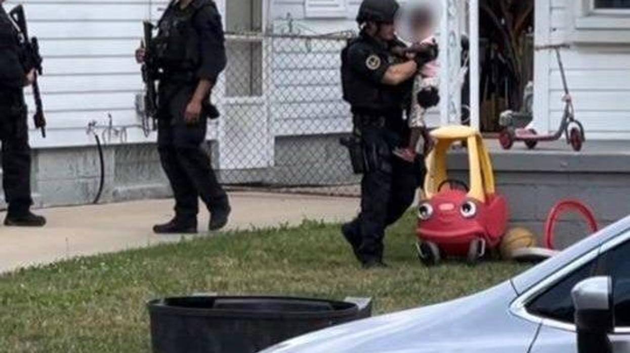 Police leaving home with child