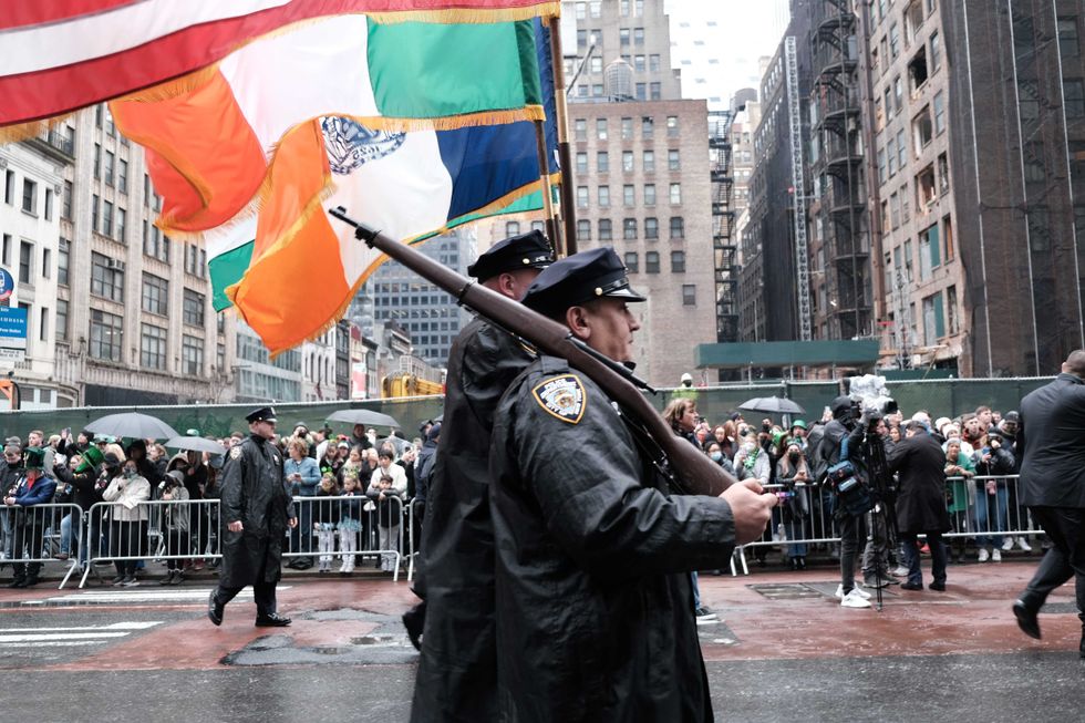 Police march in the St. Patrick
