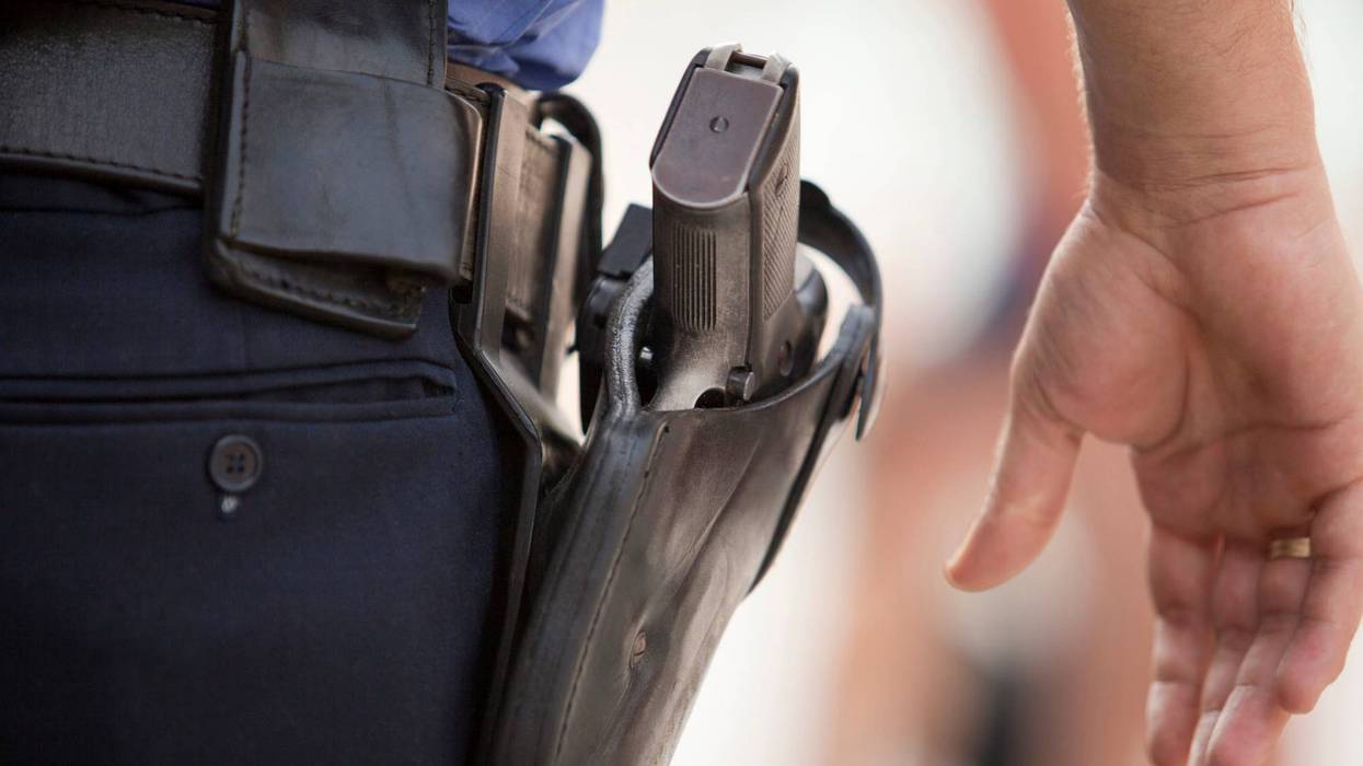 police officer with gun in holster