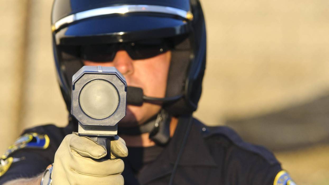 Police officer with radar gun