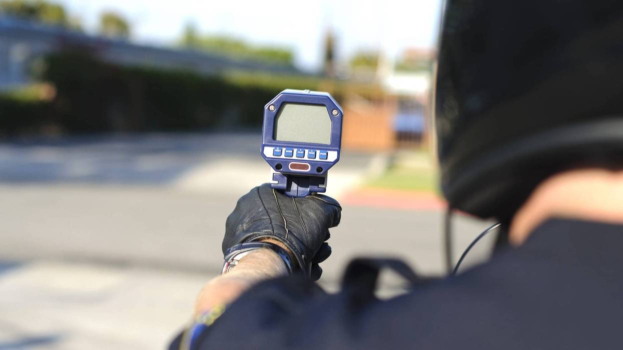 Police officer with radar gun