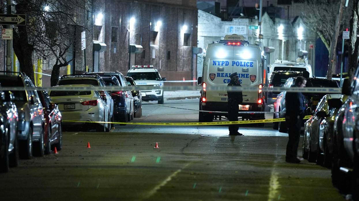 Police officers are investigating at the crime scene after a mass shooting at a nightclub in Queens on Jan. 2, 2025