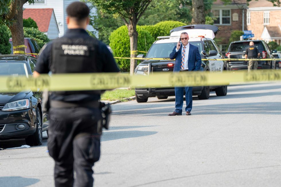 Police officers respond to a homicide investigation on Hickory Street in Teaneck on Thursday, August 15, 2024