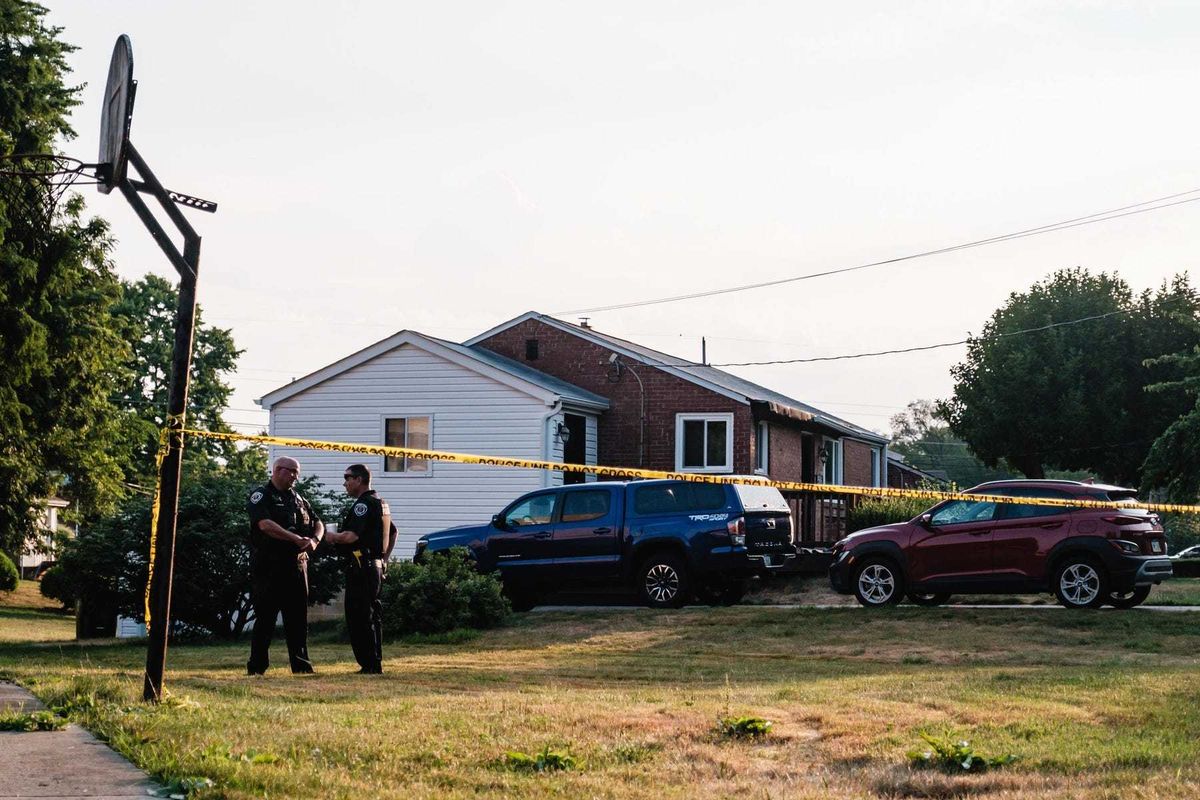 Police officers work the scene of the Crooks’ home in Bethel Park, PA, Monday, July, 15.