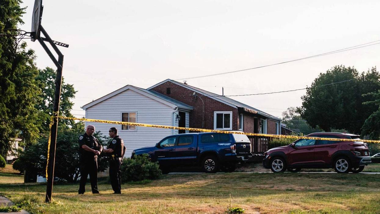 Police officers work the scene of the Crooks’ home in Bethel Park, PA, Monday, July, 15.