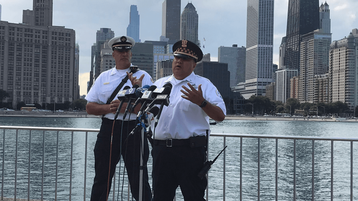 police official talking at lakefront