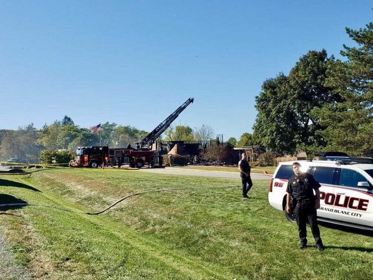 police on scene after the shooting and fire