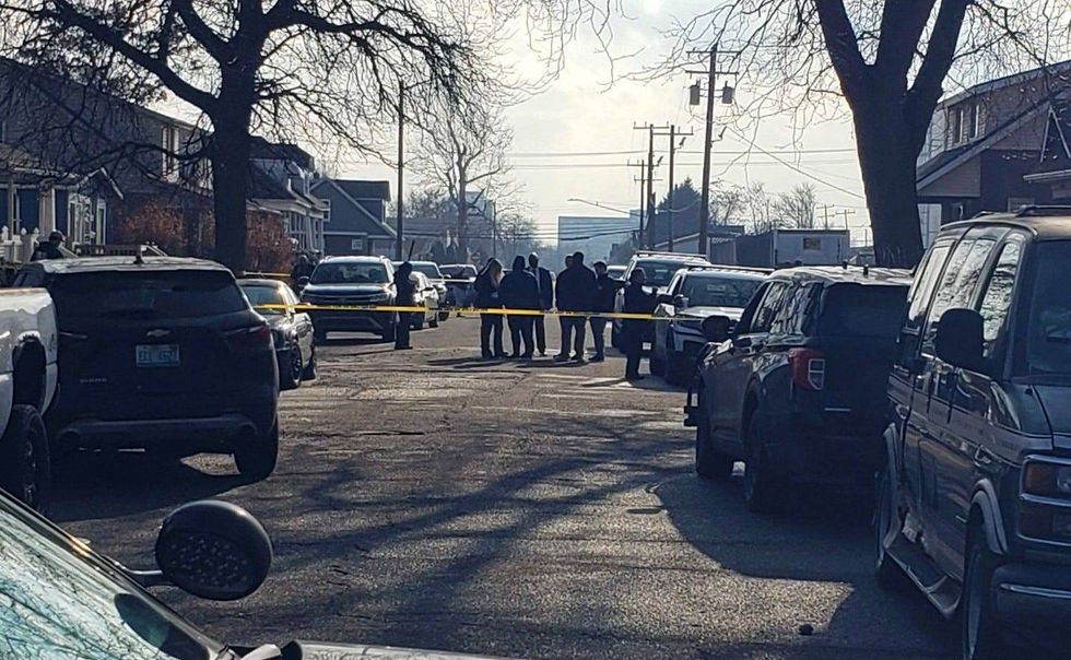 police on scene where bodies found in Detroit home