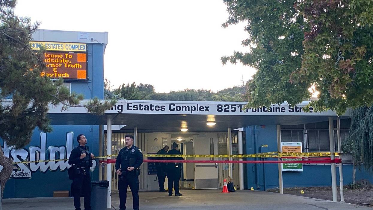 Police on the scene at the King Estates Complex in Oakland the evening after 6 people were in injured in a shooting on the campus.