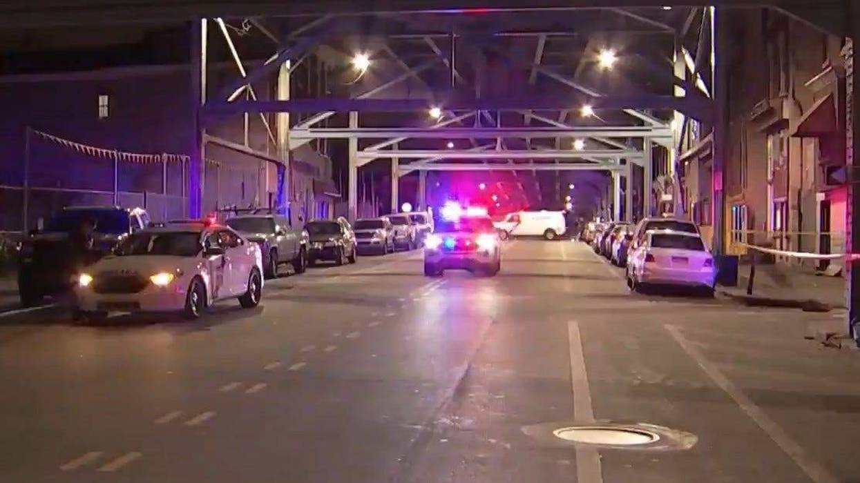 Police on the scene following a Friday night shooting in Kensington.