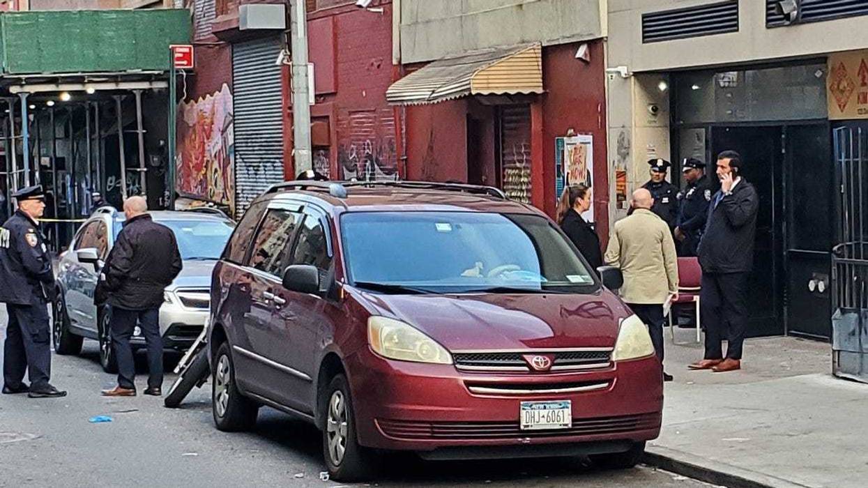 Police outside the scene of the stabbing on Division Street on Monday