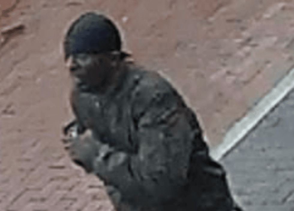Police released new video and photos of the man they say gunned down 40-year-old Elgin Reynolds.