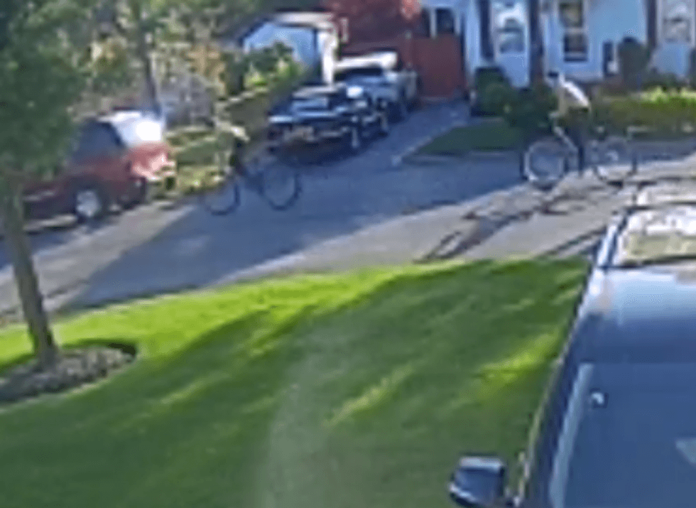 Police released video showing the two male suspects riding bikes near the scene of the incident.
