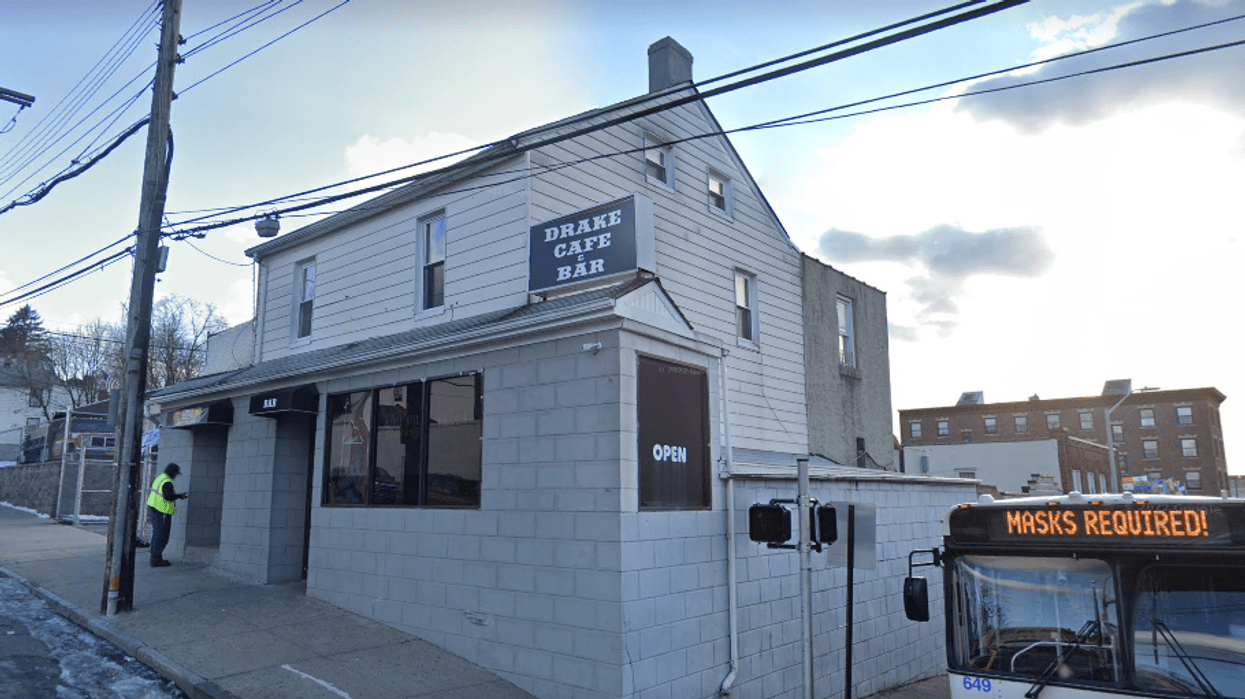 Police said a woman torched the Drake Main Café in New Rochelle during a dispute with workers