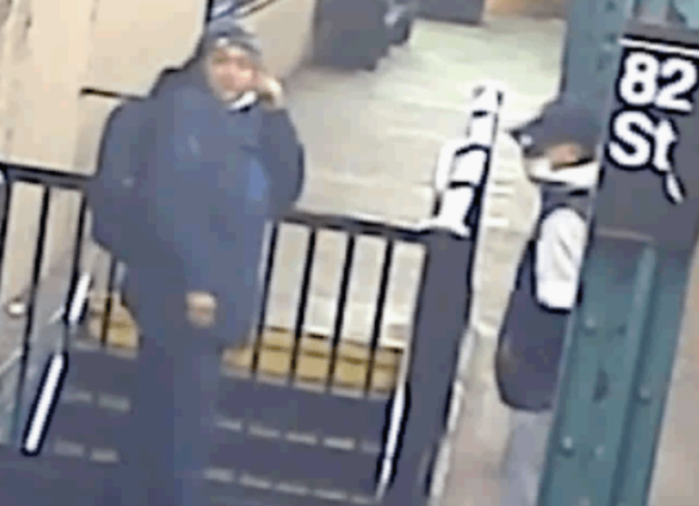 Police said these two men put a man in a headlock and stole his phone and wallet at the 82nd Street station on March 18, 2023