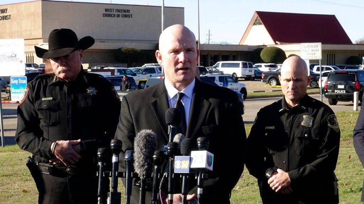 Police say congregants shot and killed a man who opened fire at the church. (