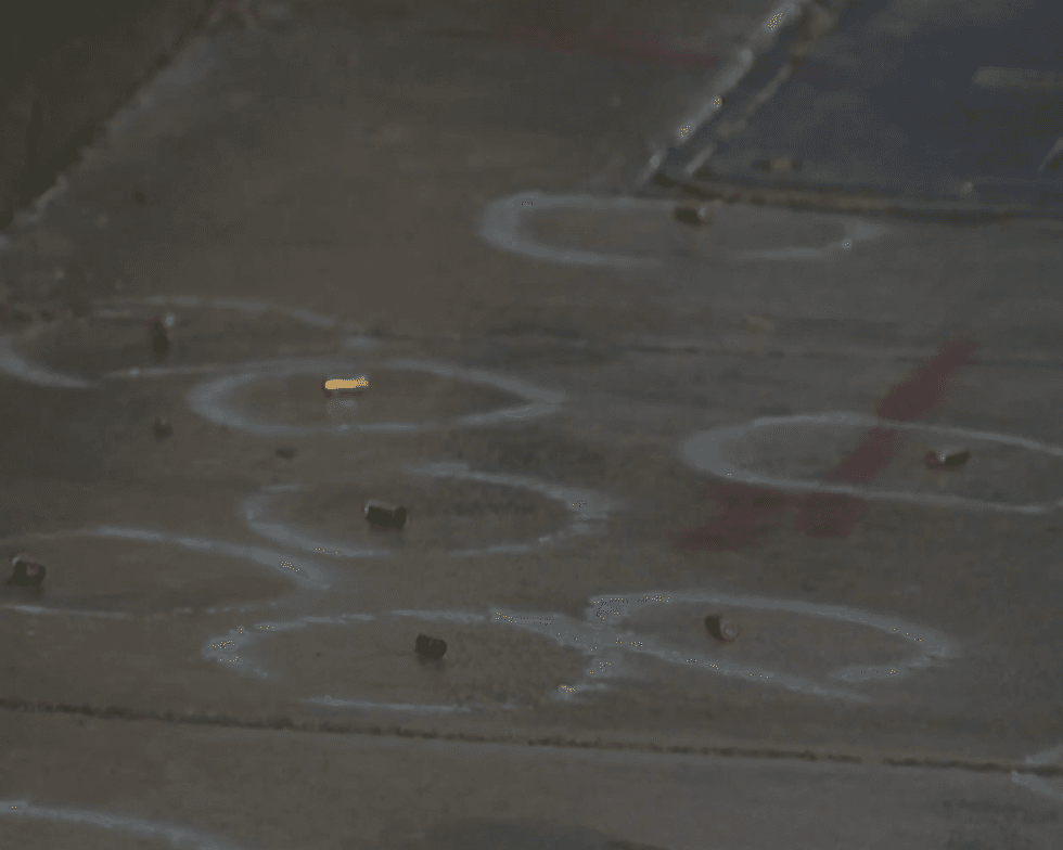 Police say the scene of a quadruple shooting in West Philadelphia on Saturday consists of at least 27 shell casings.