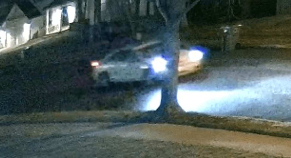 Police say the suspect in a Thursday night home invasion escaped in this white car.