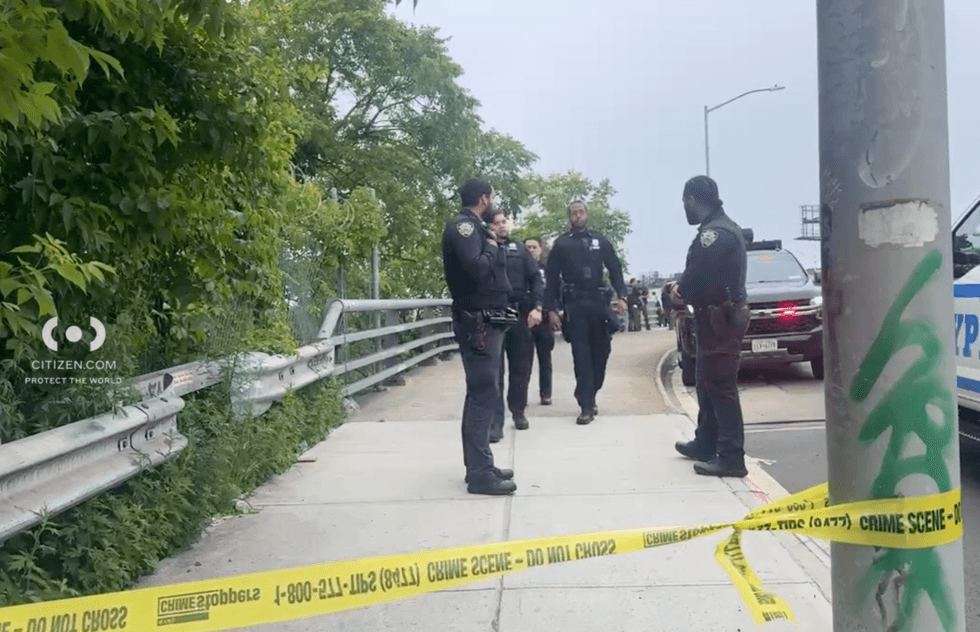 Police set up crime scene tape amid a search in the Bronx River in Hunts Point on Tuesday morning