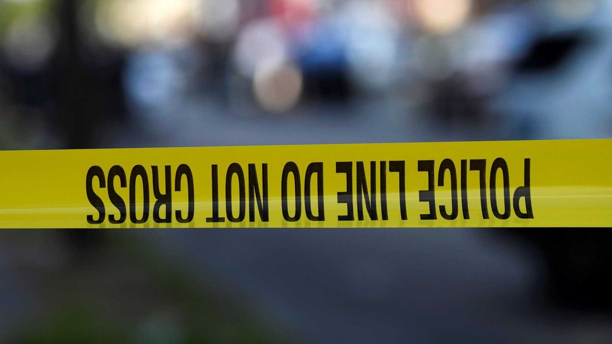 Police tape is stretched across a street near a residence during a shooting on August 14, 2019 in Philadelphia, Pennsylvania.