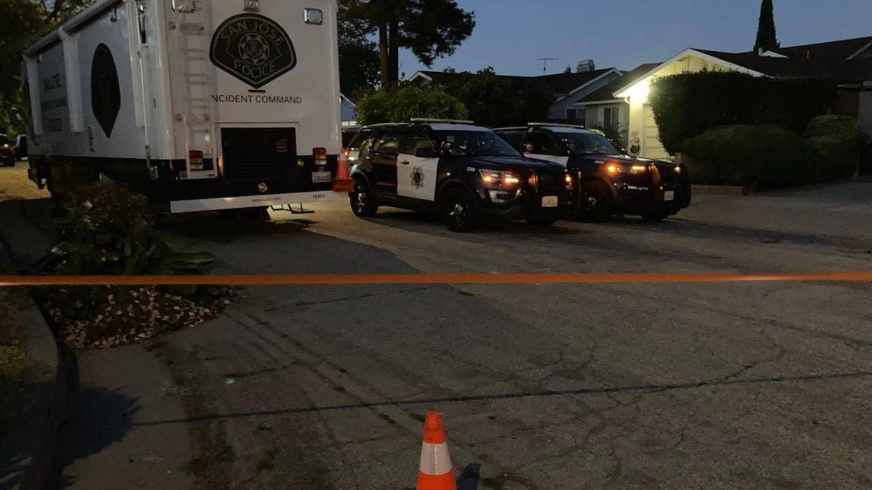 Police tape lines the Flickinger South neighborhood in San Jose early Monday.
