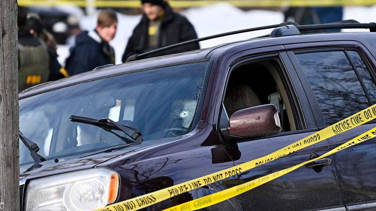 Police tape surrounds a vehicle suspected to be involved in a shooting by an ICE agent during federal law enforcement operations on January 07, 2026 in Minneapolis, Minnesota. According to federal officials, the agent, “fearing for his life” killed a woman during a confrontation in south Minneapolis.