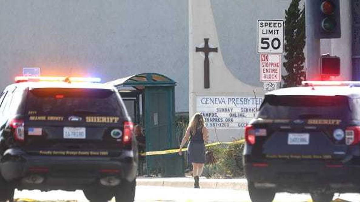 Police vehicles are parked near the scene of a shooting at the Geneva Presbyterian Church on May 15, 2022 in Laguna Woods, California. According to police, the shooting left one person dead, four critically wounded, and one with minor injuries.