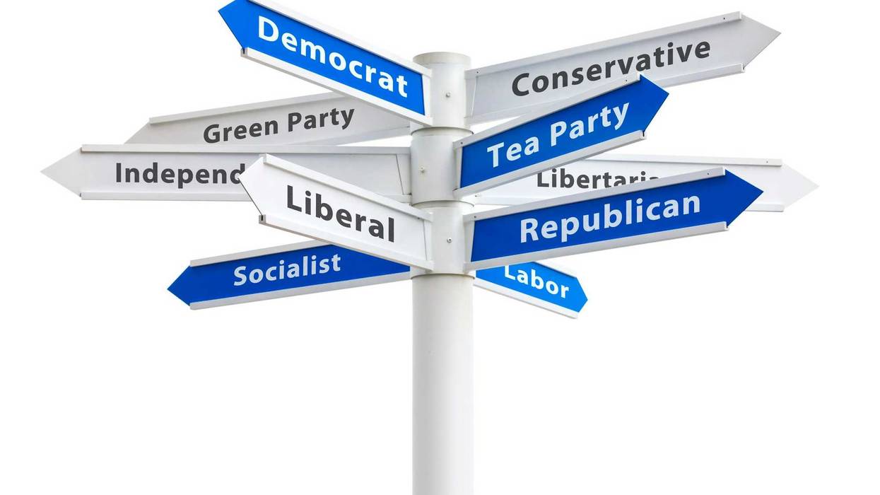 Political parties on a crossroads sign featuring Democrat and Republican