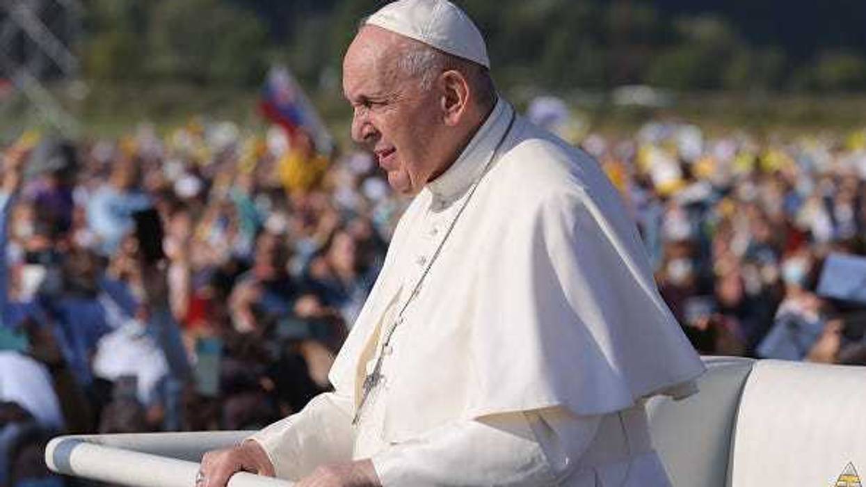 Pope Francis rides his Pope mobile through a crowd of pilgrims before holding an open-air mass on September 15, 2021 in Sastin, Slovakia.